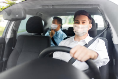 male taxi driver wearing face protective medical mask 