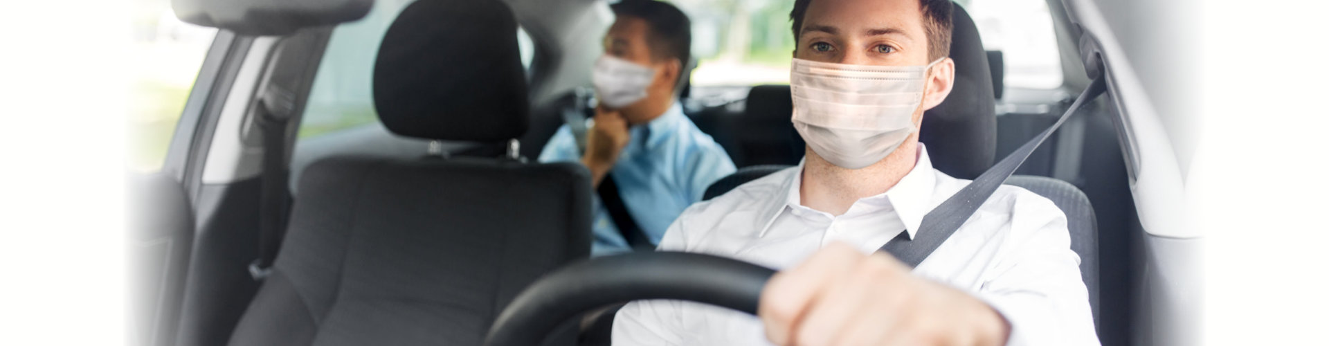 male taxi driver wearing face protective medical mask
